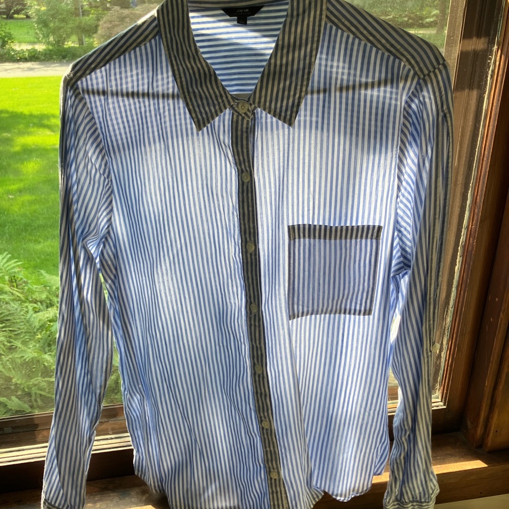 Blouse with slit sleeves.